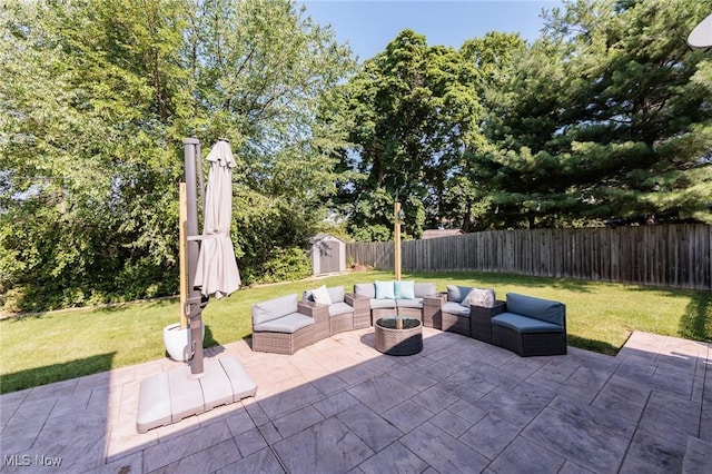 14344 S Gateway Dr, North Royalton, OH 44133 - fenced backyard featuring a storage shed, a patio area, and outdoor lounge area
