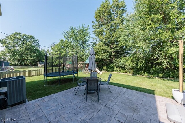 14344 S Gateway Dr, North Royalton, OH 44133 - view of patio featuring a trampoline and outdoor dining area