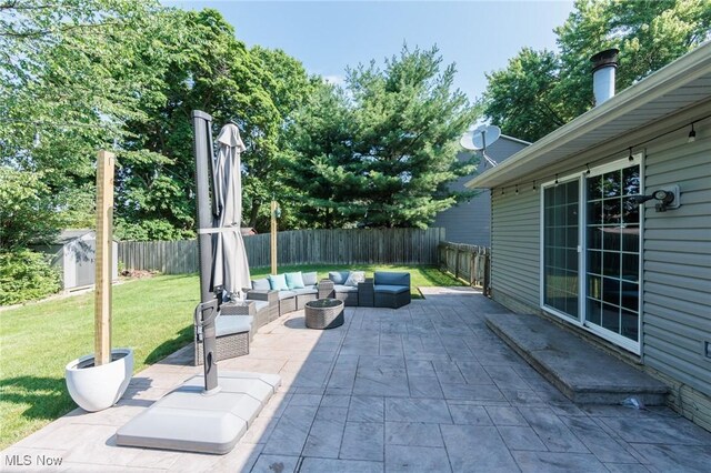 14344 S Gateway Dr, North Royalton, OH 44133 - fenced backyard with outdoor lounge area, a patio area, and a storage shed