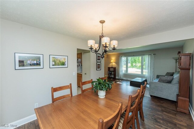 14344 S Gateway Dr, North Royalton, OH 44133 - dining space with a chandelier and dark wood-type flooring