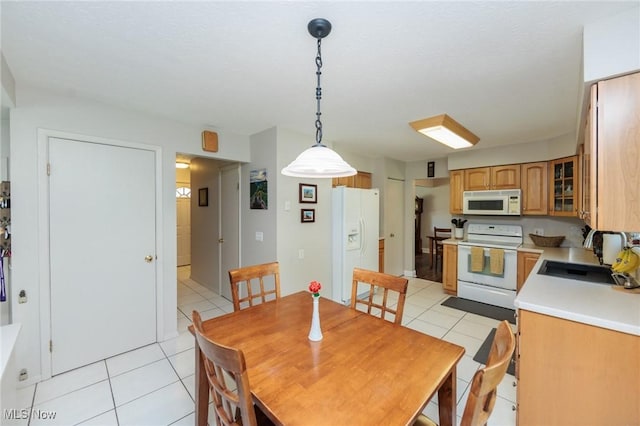 14344 S Gateway Dr, North Royalton, OH 44133 - dining space with light tile patterned floors