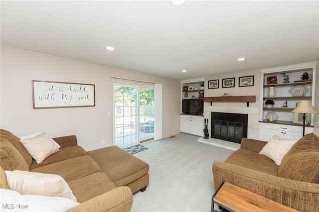 14344 S Gateway Dr, North Royalton, OH 44133 - living area with a tiled fireplace, light colored carpet, and recessed lighting