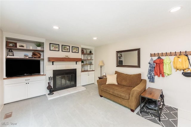 14344 S Gateway Dr, North Royalton, OH 44133 - carpeted living area featuring a fireplace, recessed lighting, and built in shelves