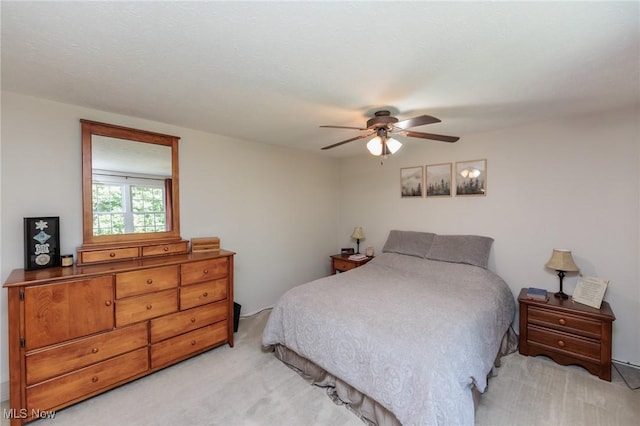 14344 S Gateway Dr, North Royalton, OH 44133 - bedroom with light carpet and ceiling fan