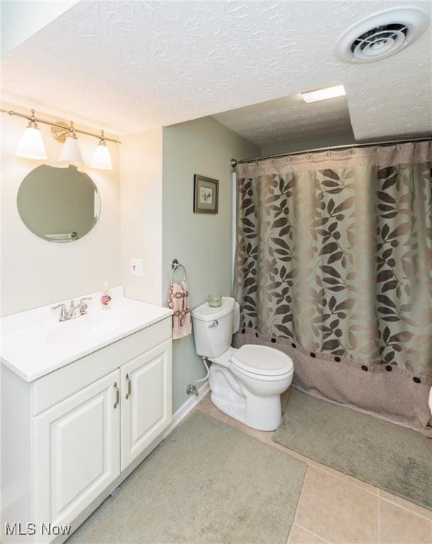 14344 S Gateway Dr, North Royalton, OH 44133 - bathroom with vanity, tile patterned floors, and curtained shower