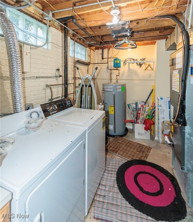 14344 S Gateway Dr, North Royalton, OH 44133 - laundry area featuring water heater, independent washer and dryer, and heating unit