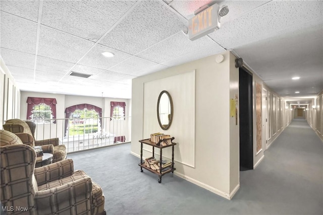 2021 King James Pkwy Unit 228, Westlake, OH 44145 - carpeted living room with baseboards and a paneled ceiling