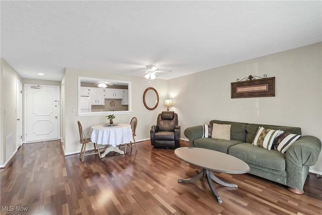 2021 King James Pkwy Unit 228, Westlake, OH 44145 - living area featuring dark wood-style floors and ceiling fan