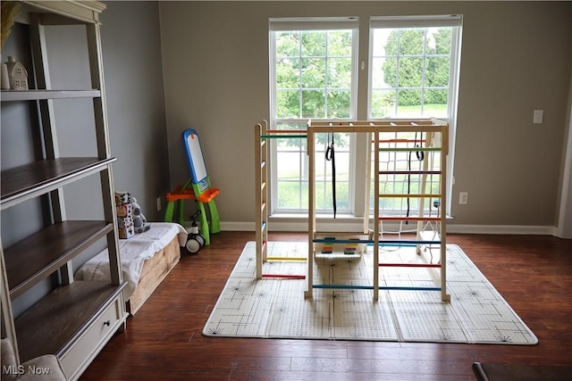 7509 Galena Ave NW, Canal Fulton, OH 44614 - recreation room featuring healthy amount of natural light and dark wood finished floors