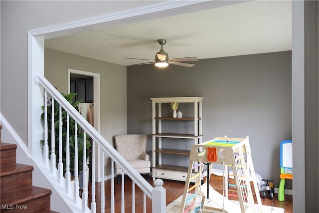 7509 Galena Ave NW, Canal Fulton, OH 44614 - stairway featuring wood finished floors and a ceiling fan