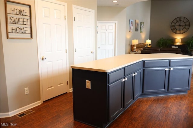 7509 Galena Ave NW, Canal Fulton, OH 44614 - kitchen with open floor plan, light countertops, dark wood-type flooring, a center island, and recessed lighting