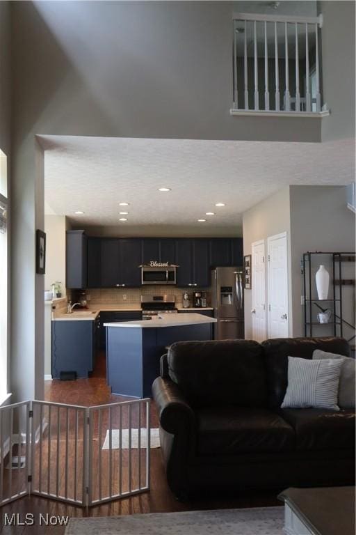 7509 Galena Ave NW, Canal Fulton, OH 44614 - living area featuring dark wood finished floors