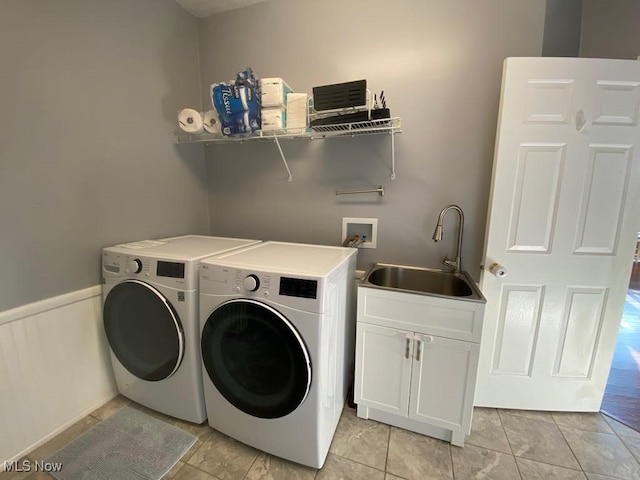 7509 Galena Ave NW, Canal Fulton, OH 44614 - laundry room featuring washing machine and clothes dryer, cabinet space, and wainscoting