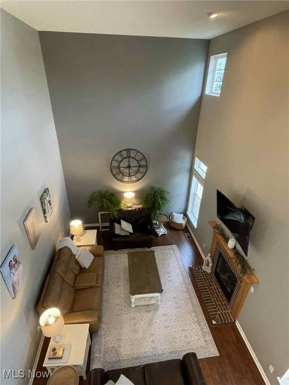 7509 Galena Ave NW, Canal Fulton, OH 44614 - living area featuring wood finished floors and a fireplace