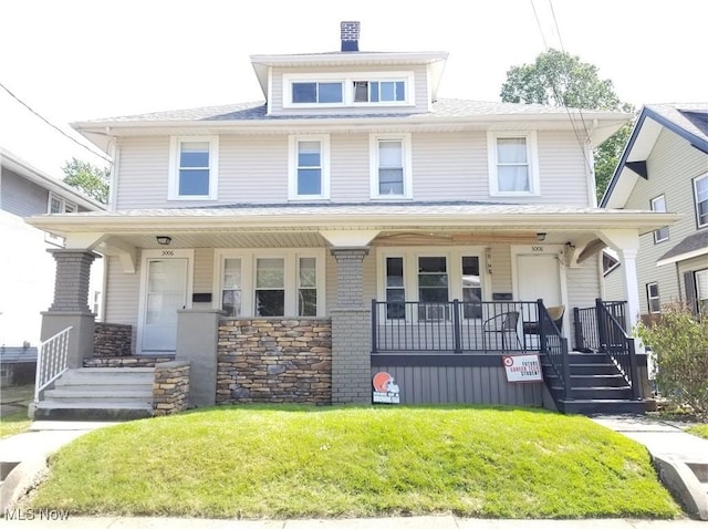 3006 6th St SW, Canton, OH 44710 - traditional style home with covered porch and a front yard