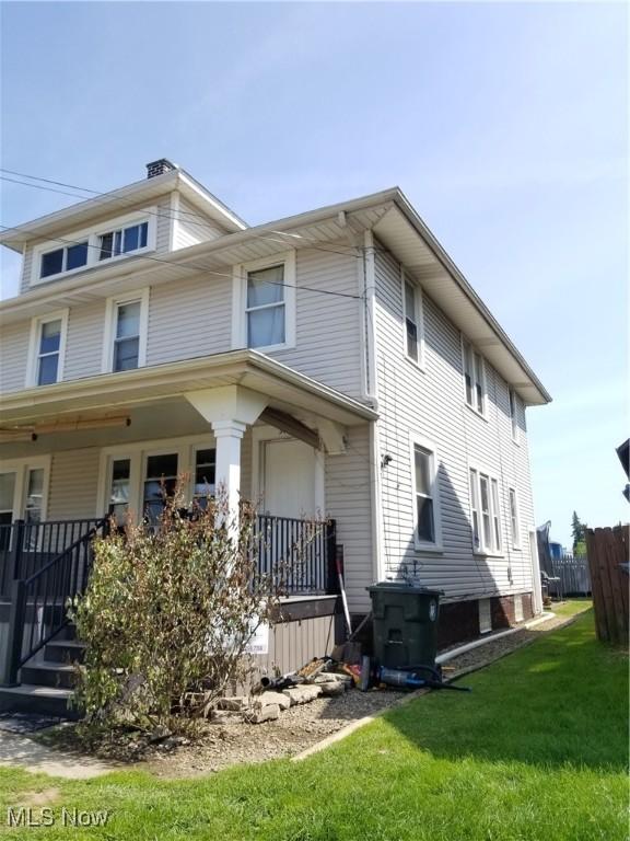 3006 6th St SW, Canton, OH 44710 - view of side of property with a porch