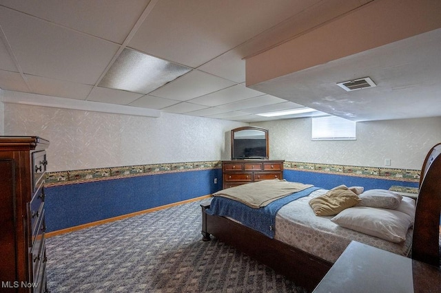 1565 Lois St, Belpre, OH 45714 - bedroom featuring wallpapered walls, a textured wall, a paneled ceiling, and carpet flooring