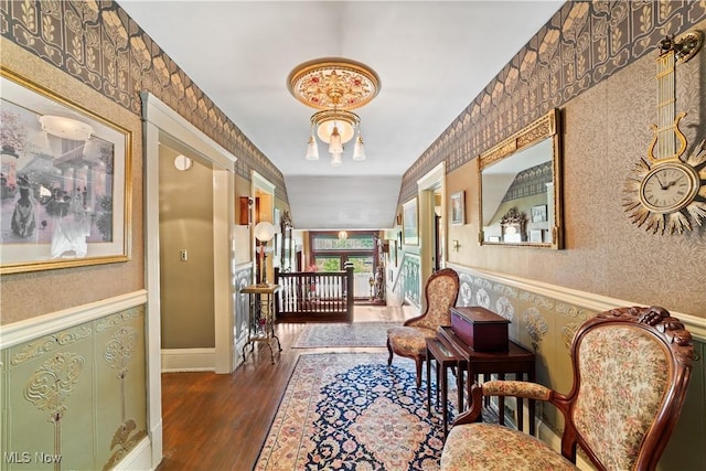 10921 Wade Park Ave, Cleveland, OH 44106 - foyer entrance with wallpapered walls and wood finished floors