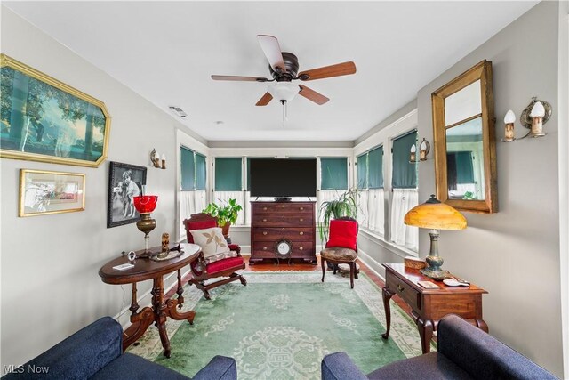10921 Wade Park Ave, Cleveland, OH 44106 - living area featuring ceiling fan and wood finished floors