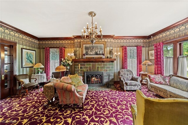 10921 Wade Park Ave, Cleveland, OH 44106 - carpeted living area with crown molding, a fireplace with flush hearth, and a chandelier