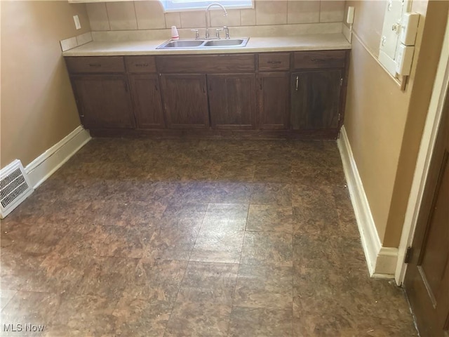 7508 Theota Ave, Parma, OH 44129 - kitchen featuring light countertops