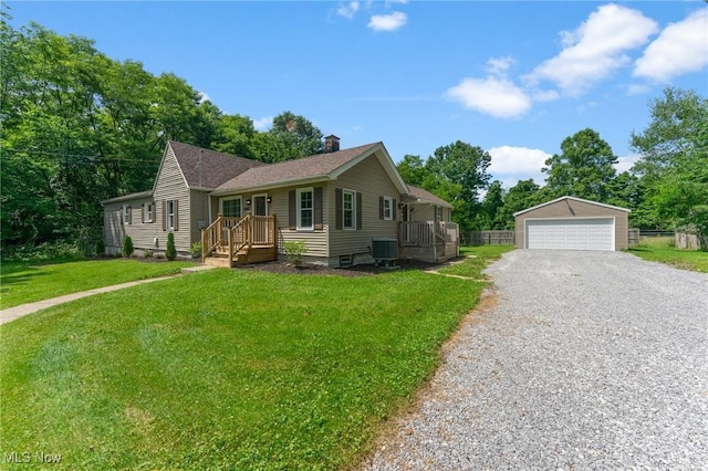 5843 Fairlawn Ave, Hubbard, OH 44425 - view of front facade with a chimney, an outbuilding, and a detached garage
