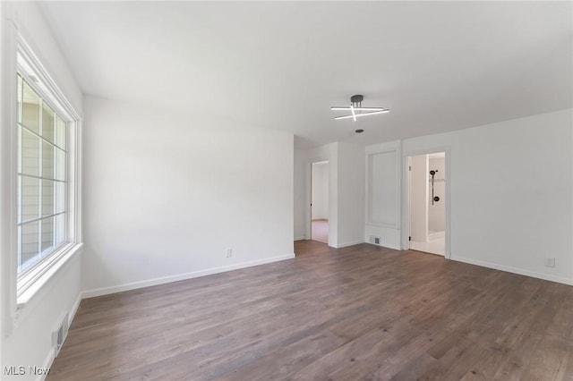 5843 Fairlawn Ave, Hubbard, OH 44425 - empty room with wood finished floors and baseboards