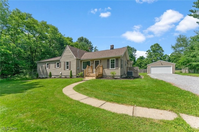 5843 Fairlawn Ave, Hubbard, OH 44425 - view of front of house featuring a chimney, an outbuilding, and a garage