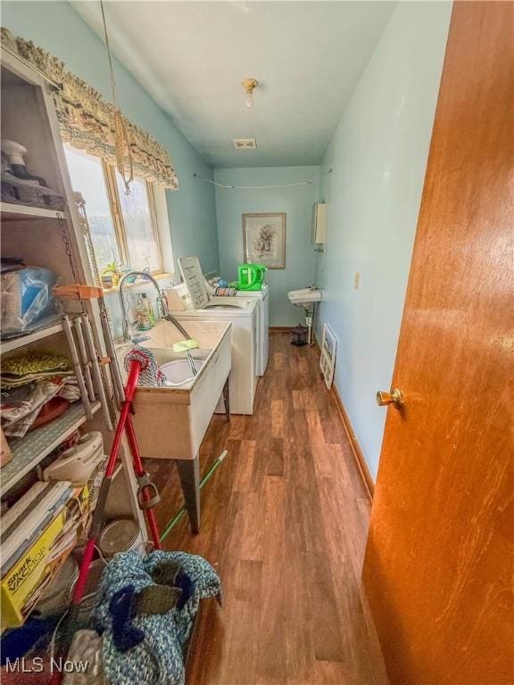 7328 S Calhoun Hwy, Mount Zion, WV 26151 - laundry area with wood finished floors and washing machine and dryer