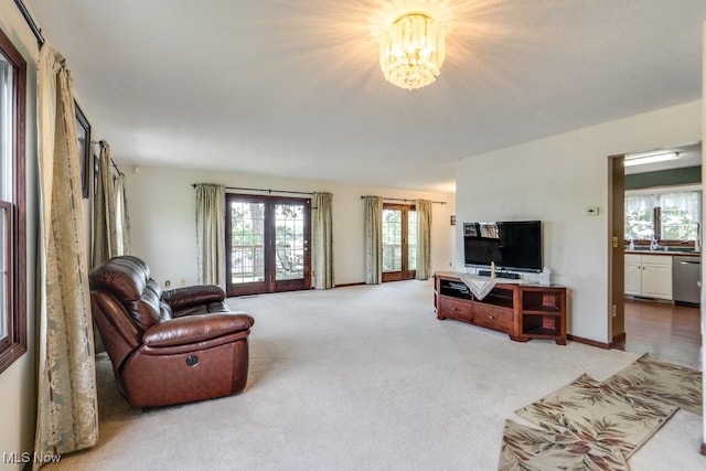 3613 Peninsula Dr, Akron, OH 44319 - living area featuring a chandelier and carpet floors