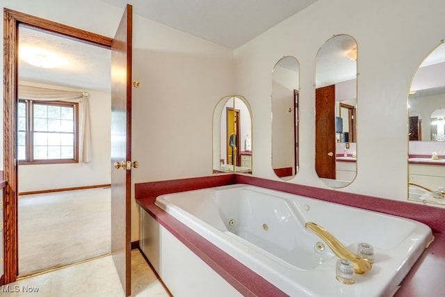 3613 Peninsula Dr, Akron, OH 44319 - full bath with a whirlpool tub and vaulted ceiling