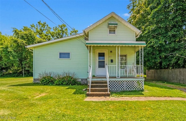 1016 W 55th St, Ashtabula, OH 44004 - bungalow-style home with a porch