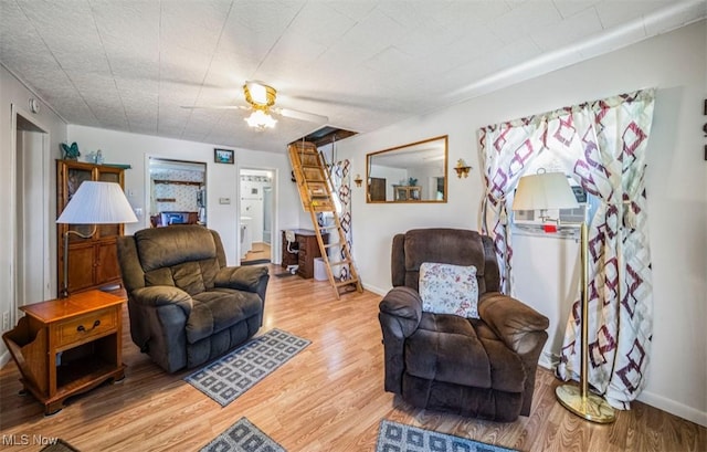 1016 W 55th St, Ashtabula, OH 44004 - living area featuring light wood-style floors and ceiling fan