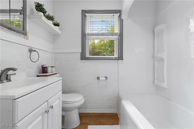 3788 Manchester Rd, Coventry, OH 44319 - full bath with vanity and wood finished floors
