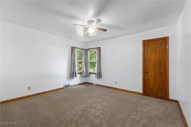 3788 Manchester Rd, Coventry, OH 44319 - carpeted empty room featuring ceiling fan and baseboards