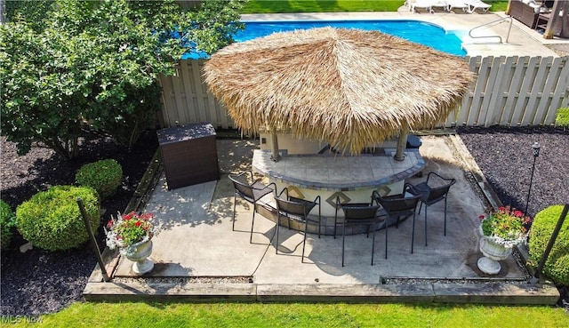 195 Sleepy Hollow Dr, Amherst, OH 44001 - fenced backyard with a patio area
