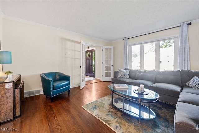 195 Sleepy Hollow Dr, Amherst, OH 44001 - living area with ornamental molding, wood finished floors, and french doors