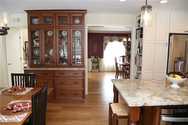 31382 Saint Andrews, Westlake, OH 44145 - dining room featuring light wood-style flooring and recessed lighting