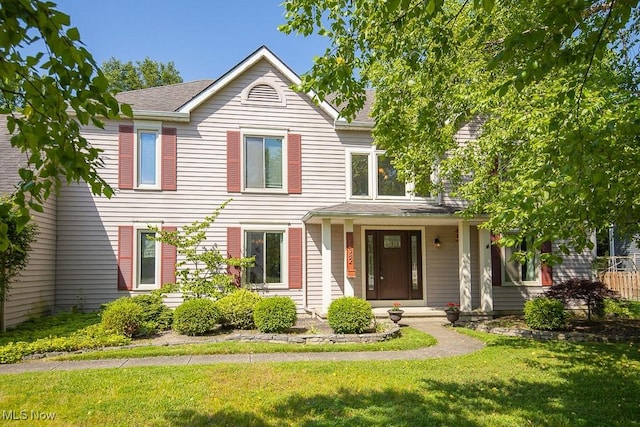 31382 Saint Andrews, Westlake, OH 44145 - view of front facade with a front yard and roof with shingles