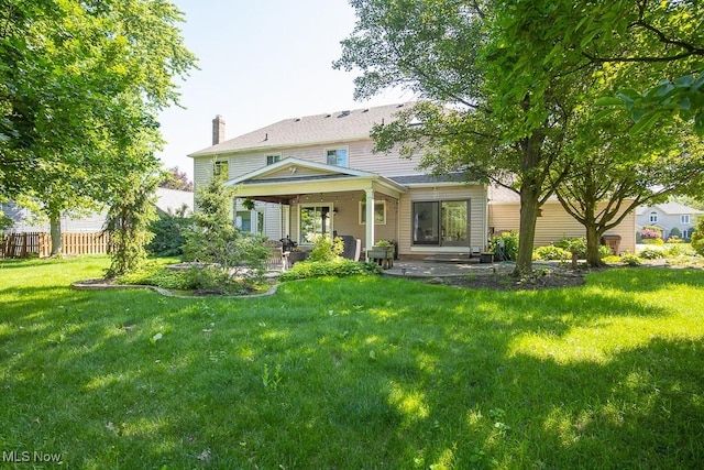 31382 Saint Andrews, Westlake, OH 44145 - rear view of house featuring a patio and a chimney