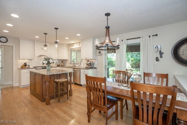 31382 Saint Andrews, Westlake, OH 44145 - dining room with light wood-type flooring, a chandelier, and recessed lighting