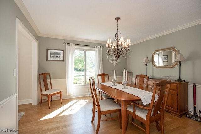 31382 Saint Andrews, Westlake, OH 44145 - dining room featuring a chandelier, light wood-type flooring, and crown molding