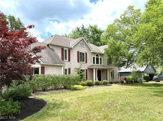 31382 Saint Andrews, Westlake, OH 44145 - view of front facade with a front lawn and a shingled roof