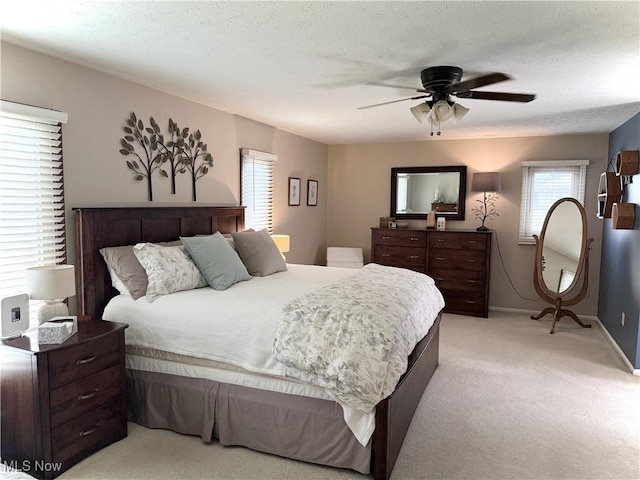 31382 Saint Andrews, Westlake, OH 44145 - bedroom with light carpet, multiple windows, and ceiling fan