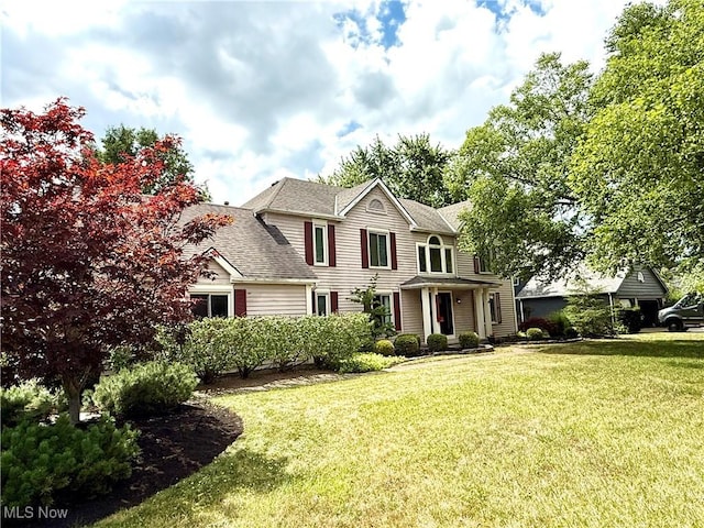 31382 Saint Andrews, Westlake, OH 44145 - view of front of property featuring a front yard and roof with shingles