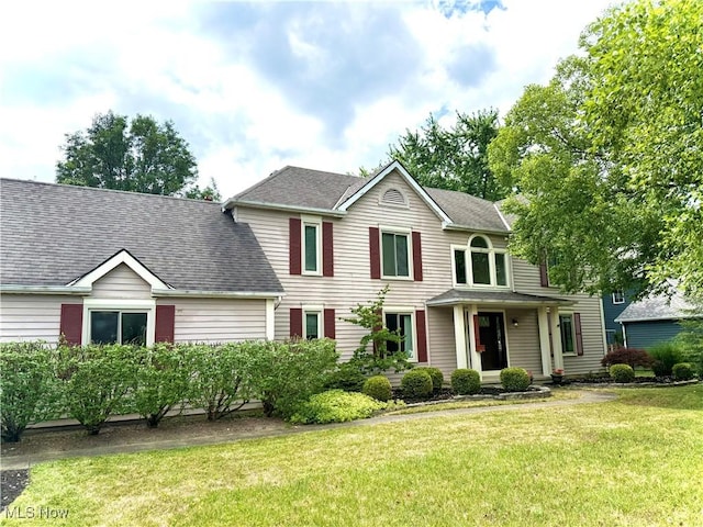 31382 Saint Andrews, Westlake, OH 44145 - view of front of property featuring a front yard and a shingled roof