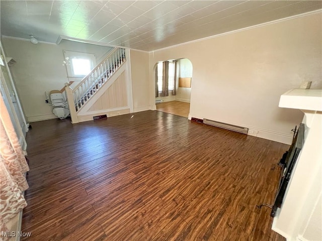 1030 Saint George St, East Liverpool, OH 43920 - unfurnished living room with crown molding, arched walkways, wood finished floors, stairs, and baseboard heating