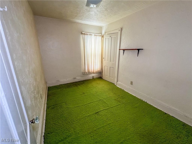1030 Saint George St, East Liverpool, OH 43920 - carpeted empty room featuring baseboards