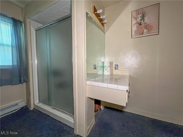 1030 Saint George St, East Liverpool, OH 43920 - full bathroom with a stall shower, baseboard heating, vanity, and carpet