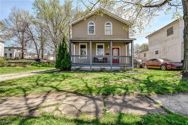 37 S Cedar St, Geneva, OH 44041 - view of front of property with a porch and a front lawn